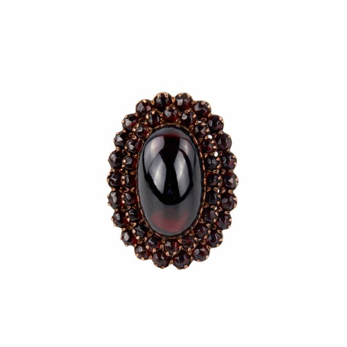 Golden ring with garnets. 