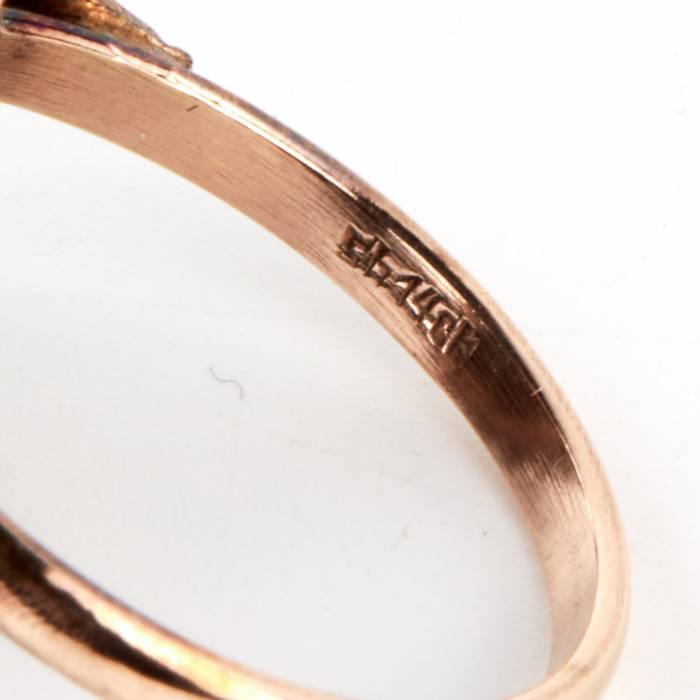 Golden ring with garnets. 