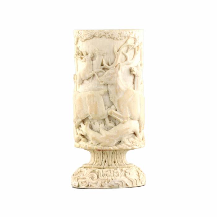 Ivory pencil holder with a hunting scene.