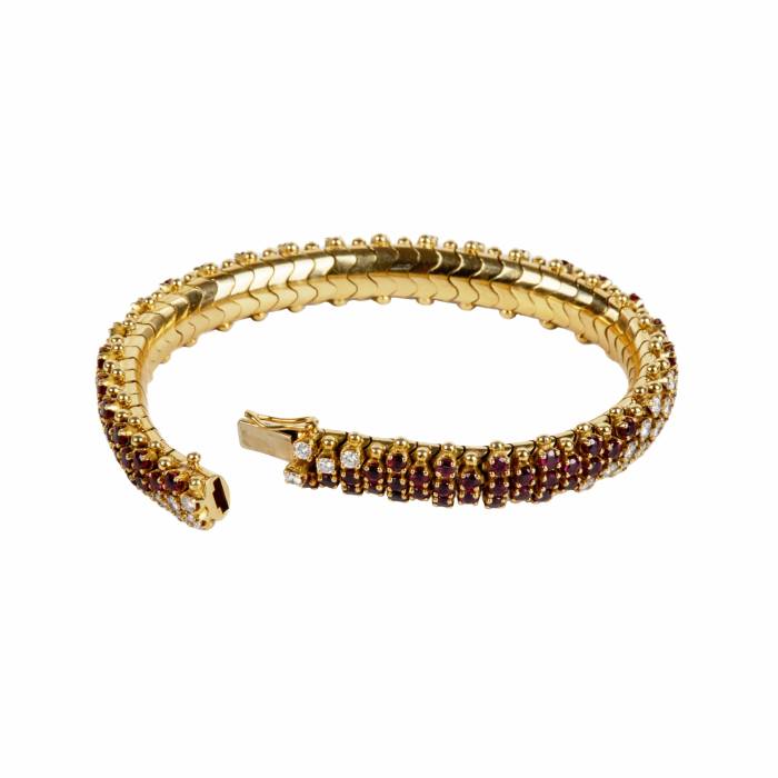 Gold bracelet with rubies and diamonds. 
