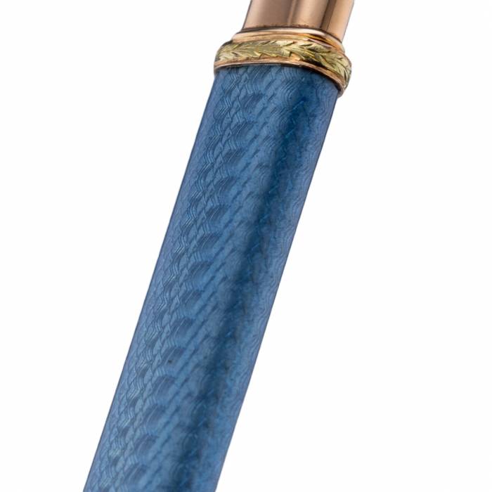 An elegant gold pencil holder in Faberge guilloche enamel. 