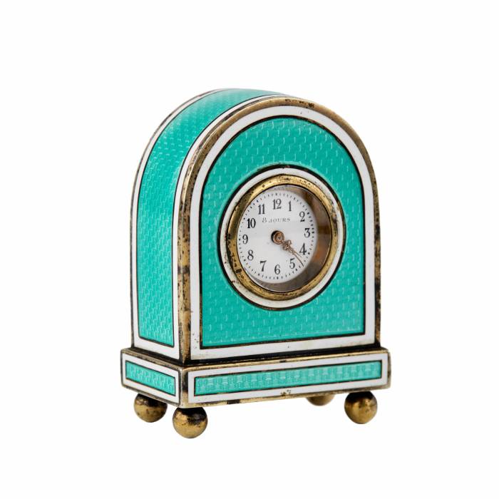 Miniature travel clock in guilloché silver enamel, in its own case. 
