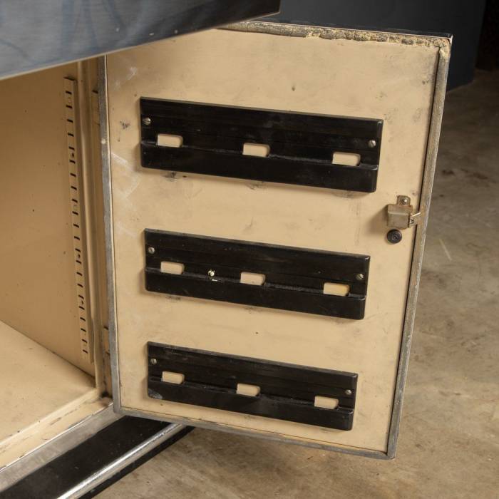 Unusual medical table and cabinet in polished metal from BAISCH. 