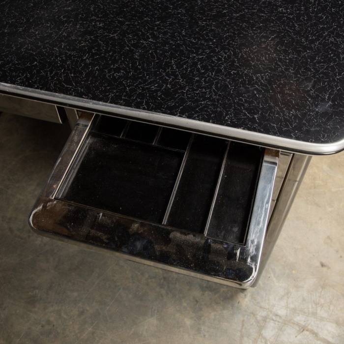 Unusual medical table and cabinet in polished metal from BAISCH. 