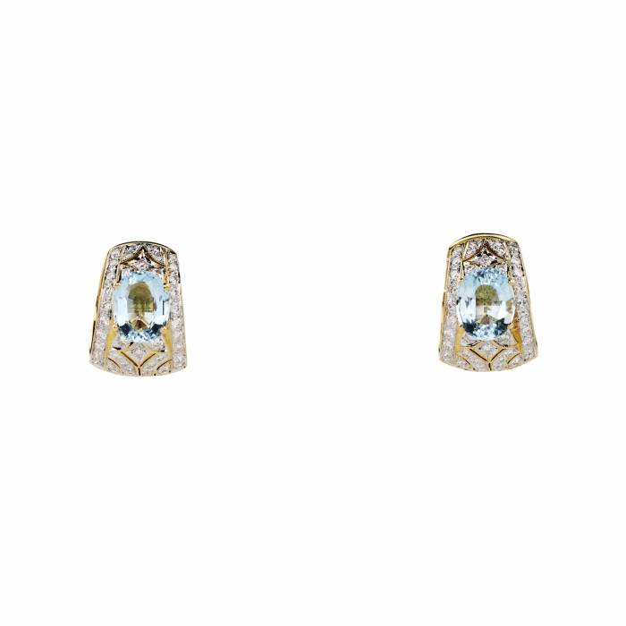 Boucles d`oreilles en or 18 carats avec aigues-marines et diamants. 