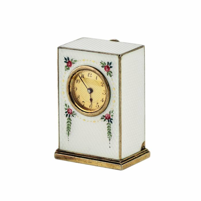 Miniature travel clock in a case, in silver and guilloche enamel, early 20th century. 
