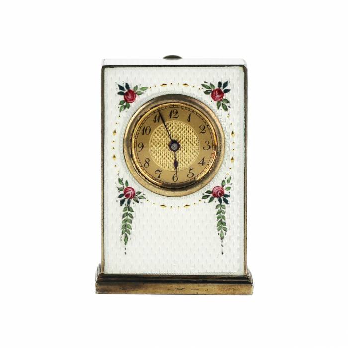 Miniature travel clock in a case, made of silver and guilloche enamel, early 20th century.