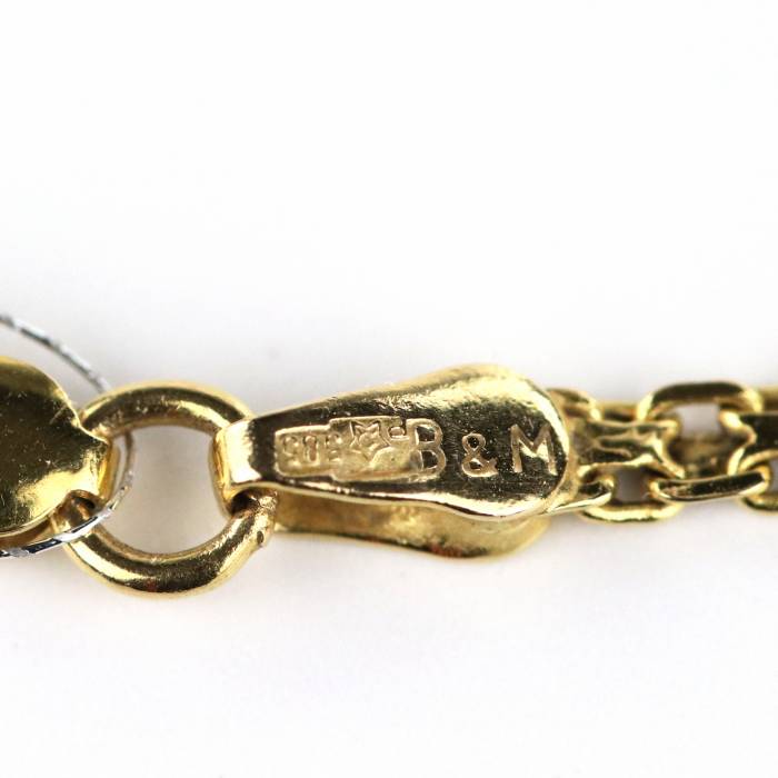 Pendentif vintage en or avec perles, diamants et émail. 