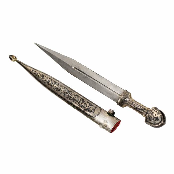 Caucasian dagger in a sheath gilded with niello. 