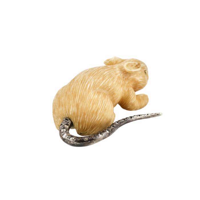 Carved mammoth tusk mouse with diamond tail. 