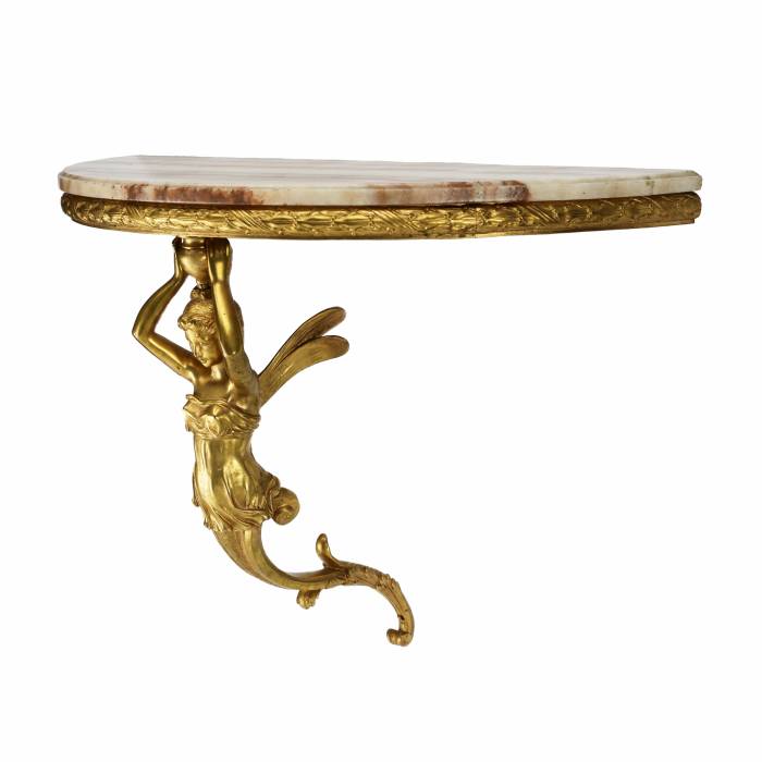 Pair of gilded bronze consoles with winged bark, in the style of Napoleon III. 19th century. 