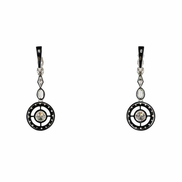 White gold 18 К earrings with diamonds. 