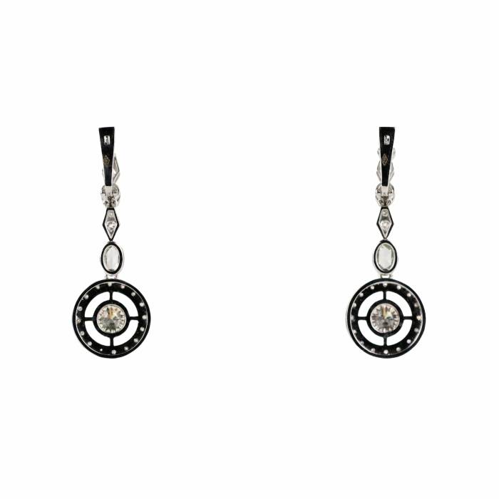 Boucles d`oreilles en or blanc  18К avec diamants. 