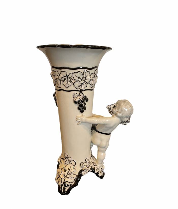  Carl Klimt - large vase with Putto and Grape Bunches. Designed circa 1915, probably by Bernhard Bloch, Eichwald ceramics. Off-white body decorated in black. (Teplitz 1876-1945 Zinnwald), start of the 20th century.