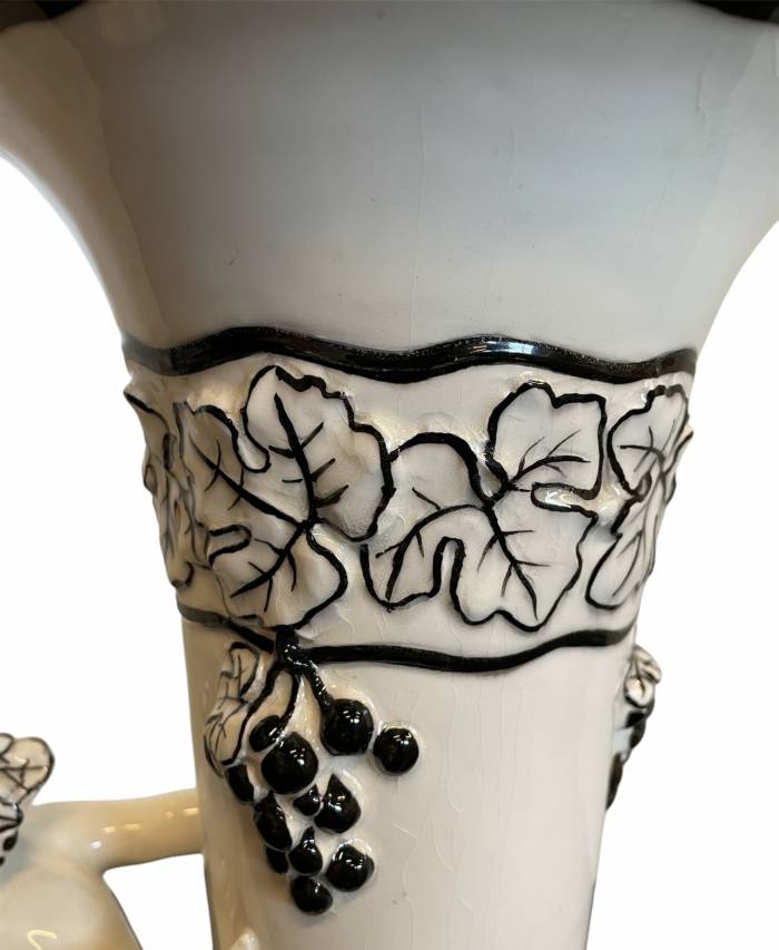  Carl Klimt - large vase with Putto and Grape Bunches. Designed circa 1915, probably by Bernhard Bloch, Eichwald ceramics. Off-white body decorated in black. (Teplitz 1876-1945 Zinnwald), start of the 20th century.