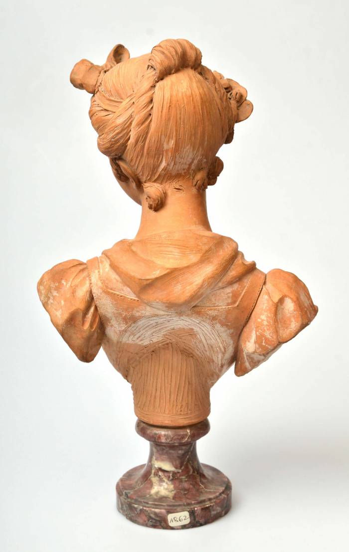 Terracotta bust on a marble base Bust of a Virgin