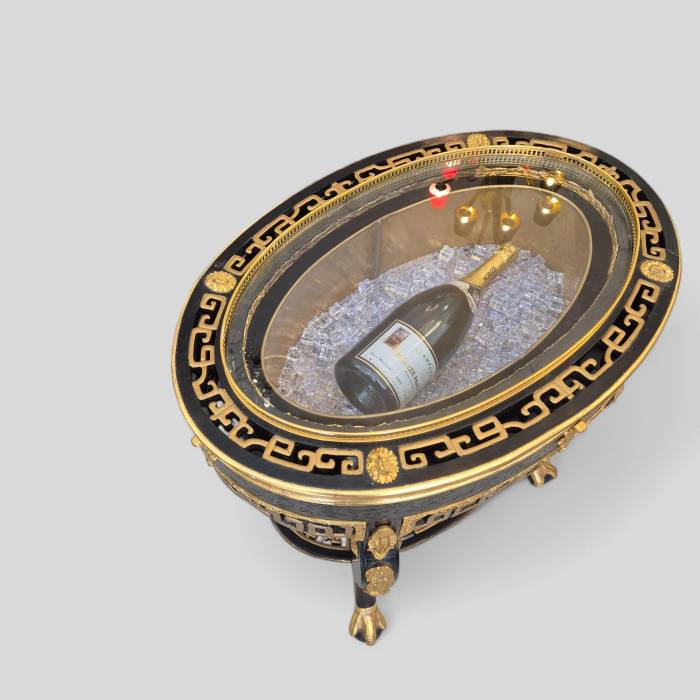 Maison ROMÉO champagne cooler, Wood and gilt bronze, circa 1970