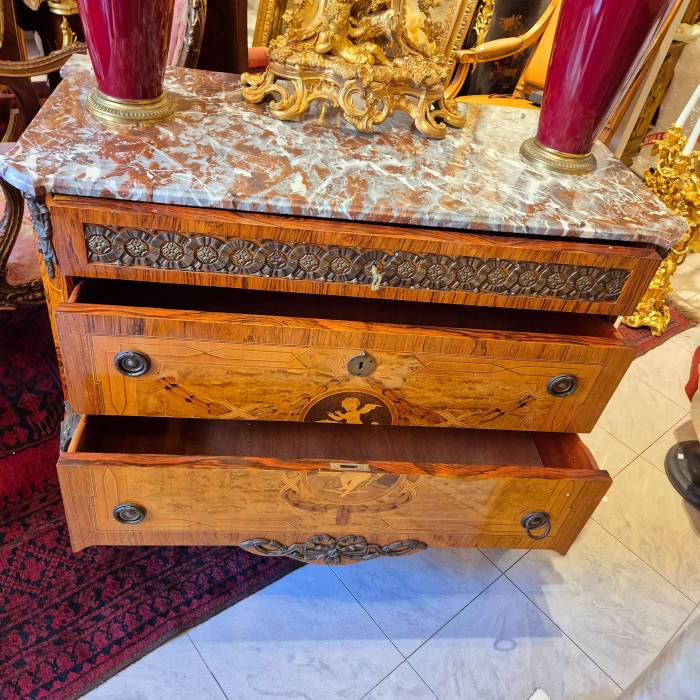 Pair of commodes in the Louis XV style, marquetry and gilt bronze, 19th century