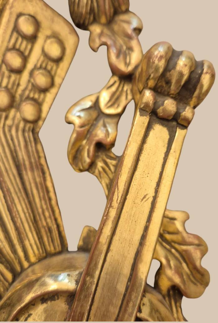 Pair of two-light gilded wood wall sconces in the Louis XVI style, 19th century