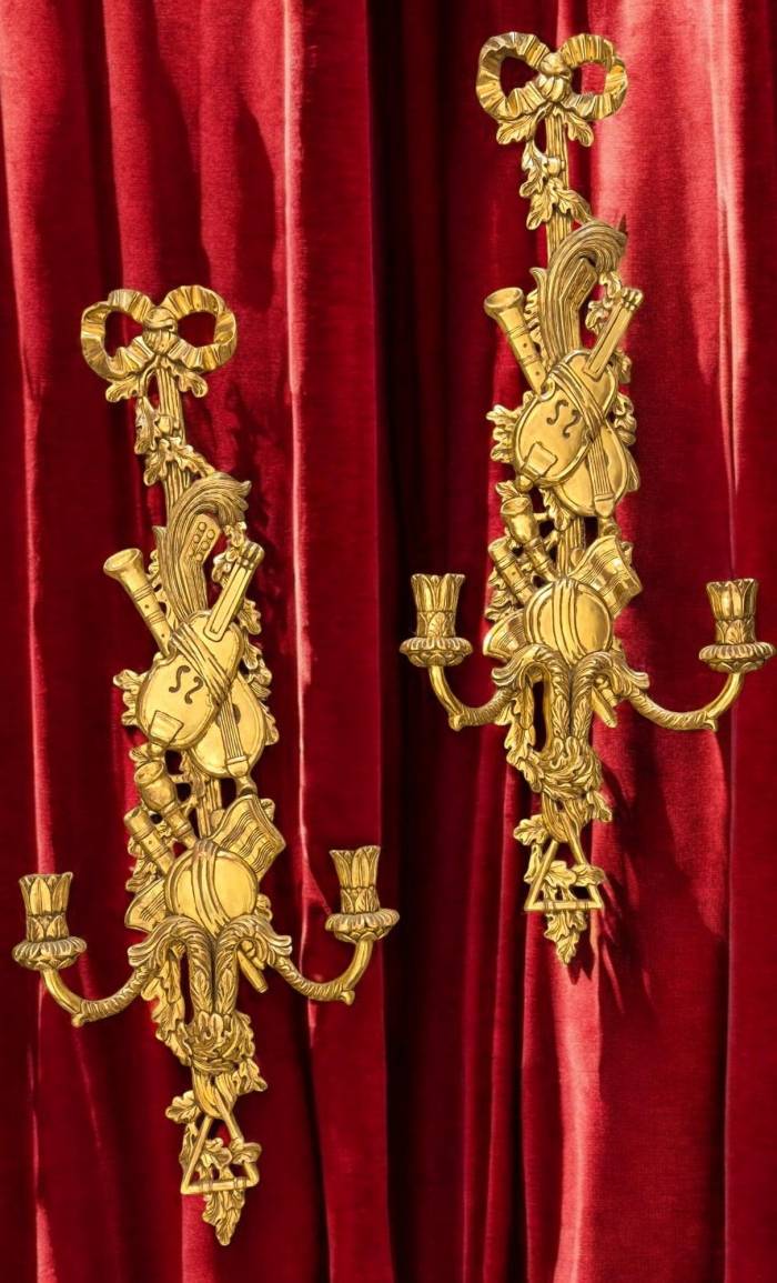 Pair of two-light gilded wood wall sconces in the Louis XVI style, 19th century