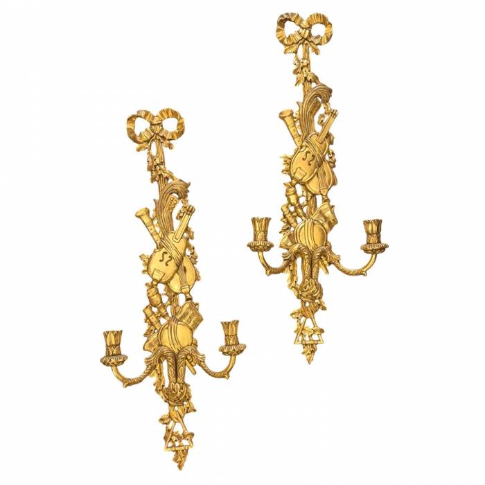 Pair of two-light gilded wood wall sconces in the Louis XVI style, 19th century