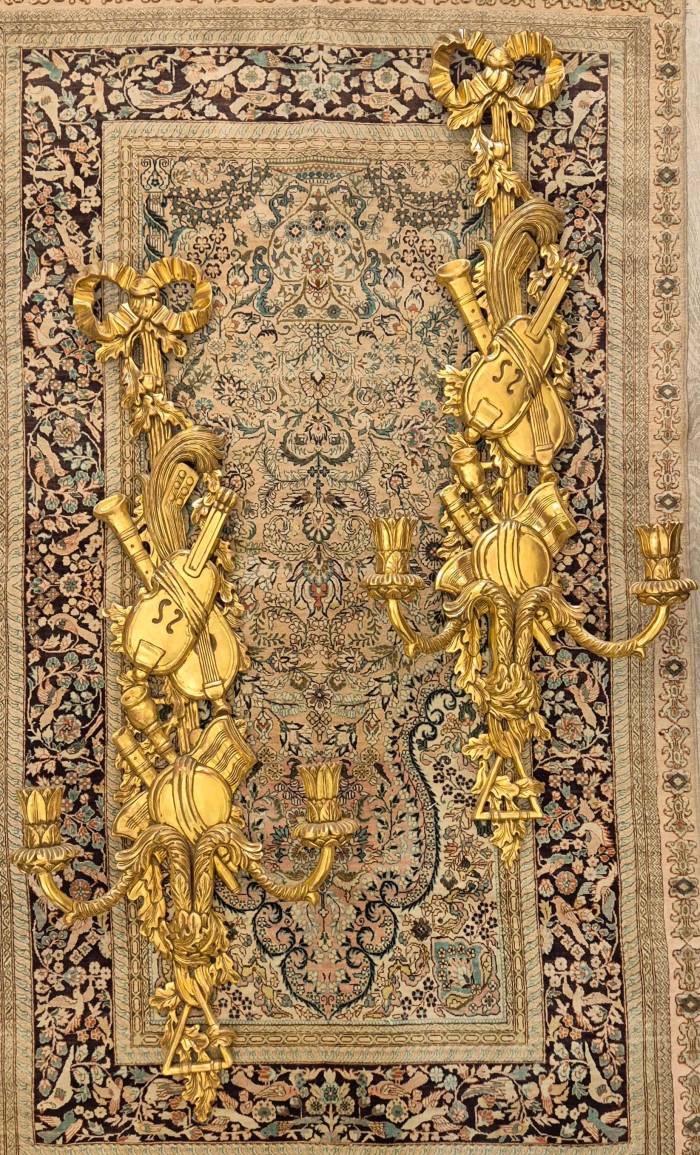 Pair of two-light gilded wood wall sconces in the Louis XVI style, 19th century