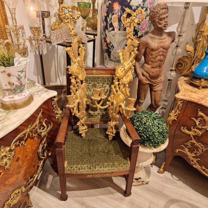 Pair of two-light gilded wood wall sconces in the Louis XVI style, 19th century