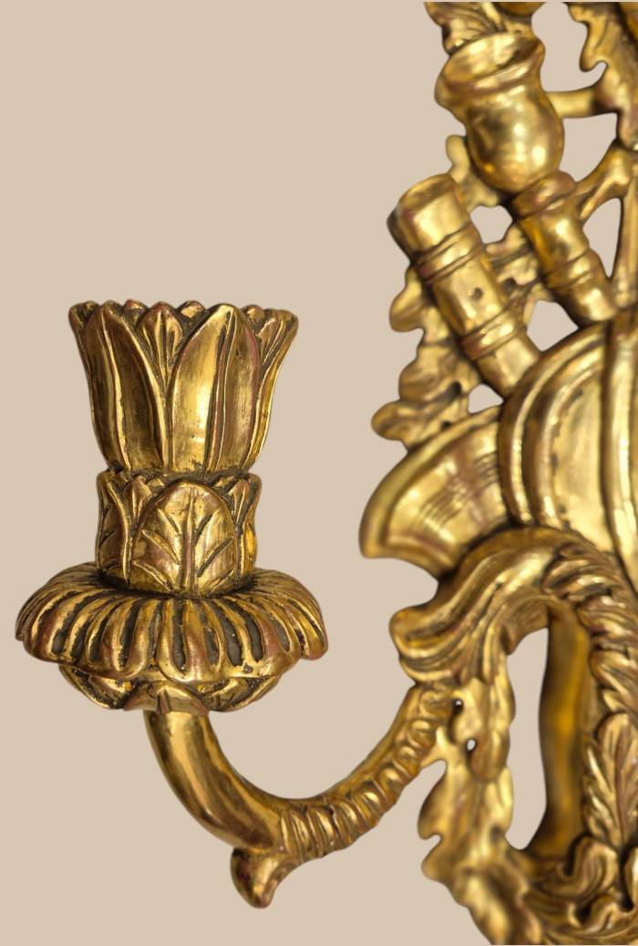 Pair of two-light gilded wood wall sconces in the Louis XVI style, 19th century