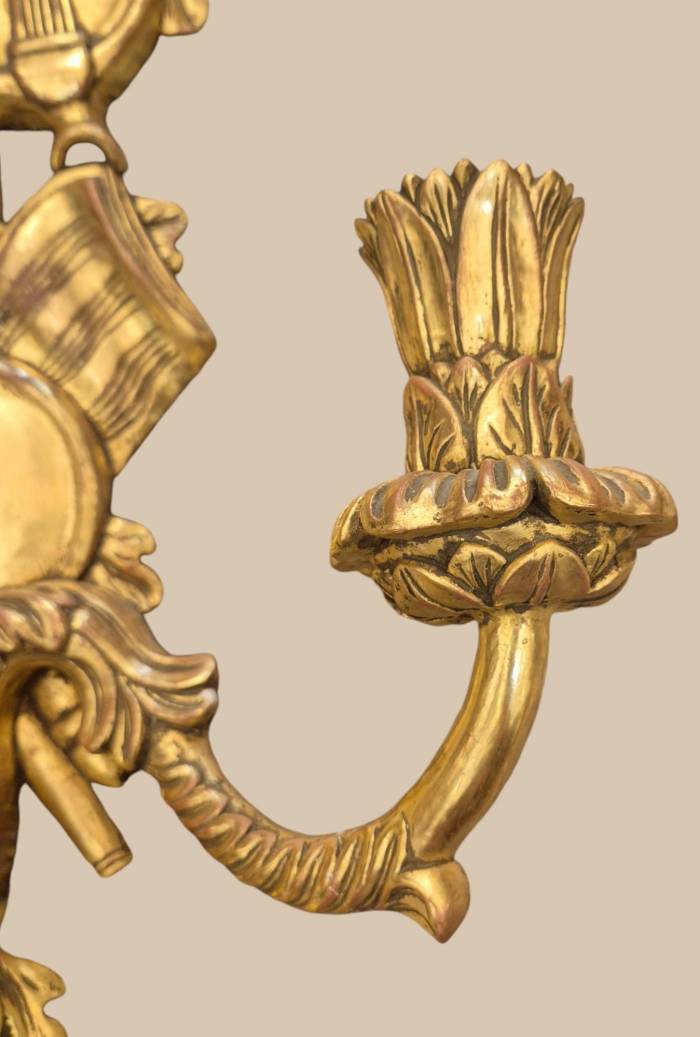 Pair of two-light gilded wood wall sconces in the Louis XVI style, 19th century