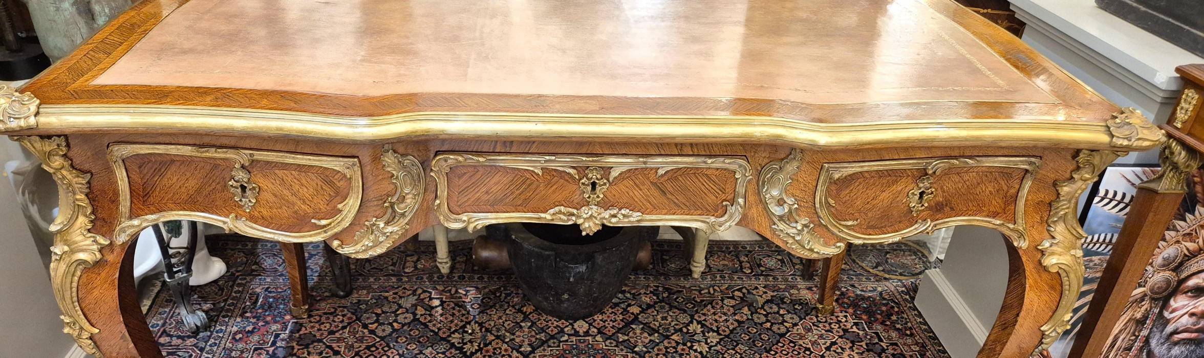 Large Louis XV style flat desk, marquetry and gilt bronze, 19th century work