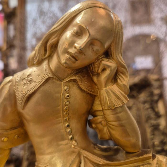 19th Century Charles X Clock with a Statue of a Romantic Young Nobleman.