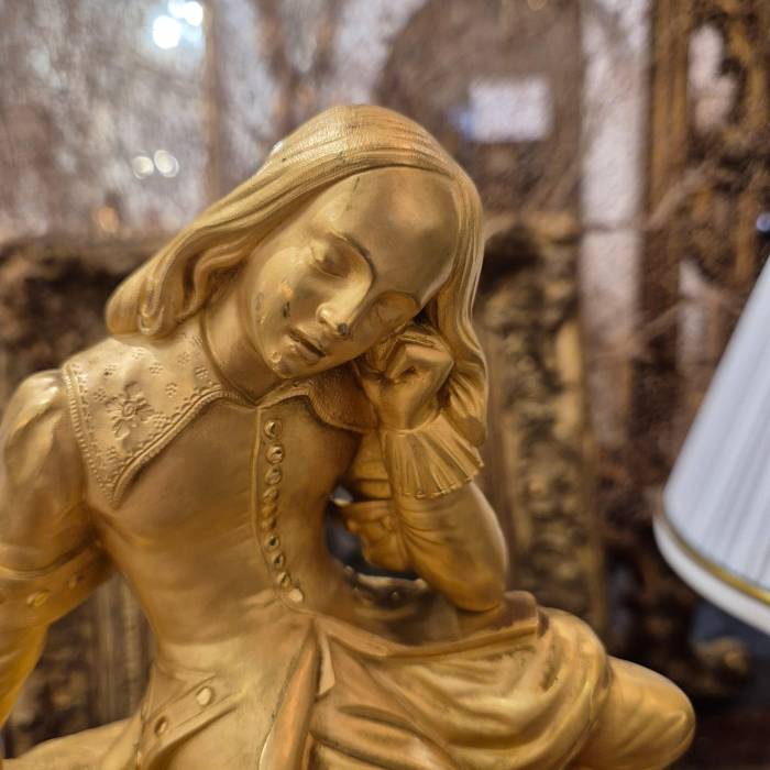 19th Century Charles X Clock with a Statue of a Romantic Young Nobleman.