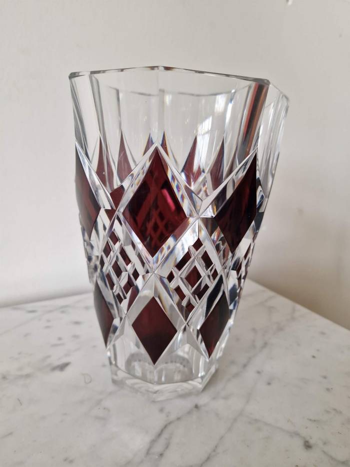 Bohemian crystal vase with bronze puti
