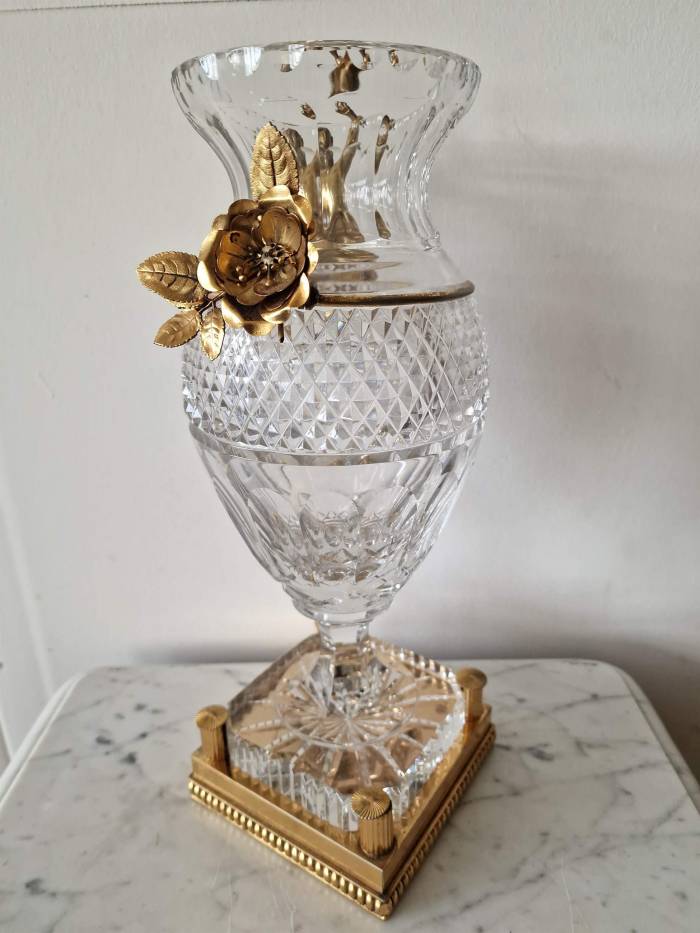 Bohemian crystal vase with bronze puti