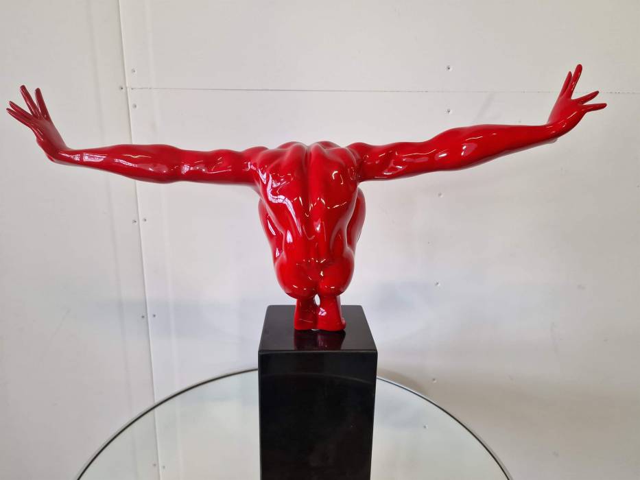 An elegant figure on a stone base