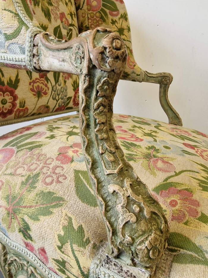 Antique armchair with detailed carvings