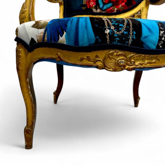 Pair of Louis XV style Gilt Armchairs with Surrealist Iconography Upholstery