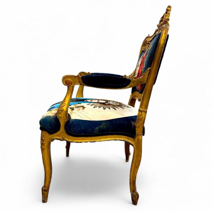 Pair of Louis XV style Gilt Armchairs with Surrealist Iconography Upholstery