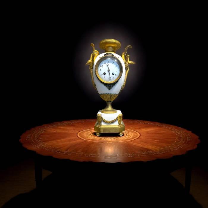 French Louis XVI Style biscuit and Gilt Bronze Mantel Clock, 19t Century