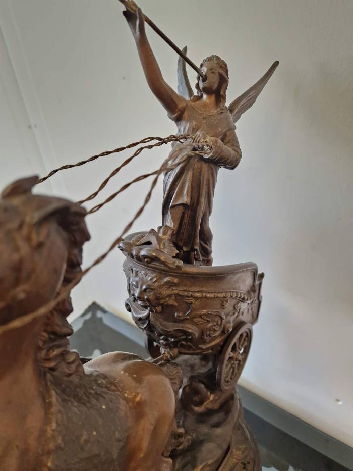 Clock with horse figures