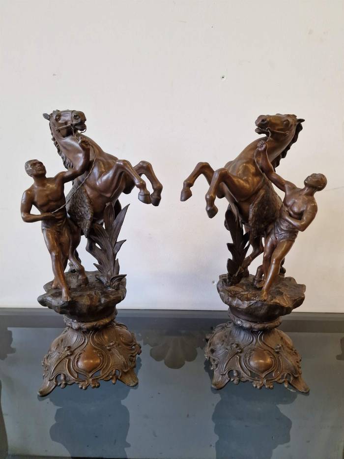 Clock with horse figures