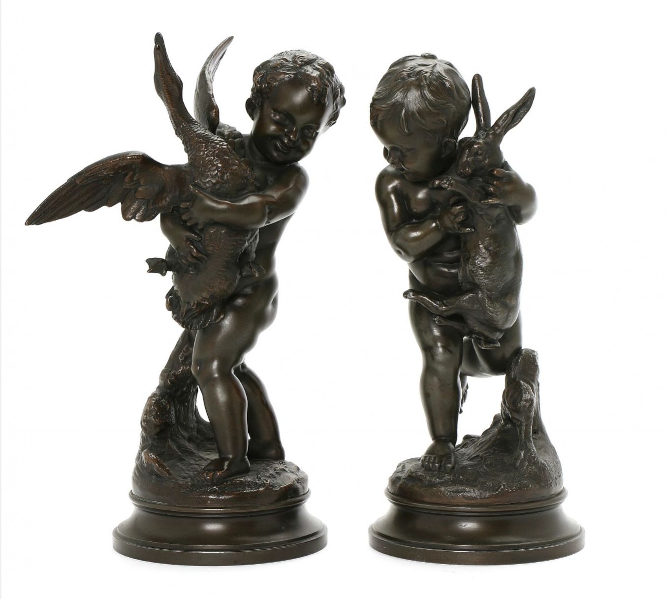 Une-paire-de-sculptures-satiriques-Jouer-aux-Cupids