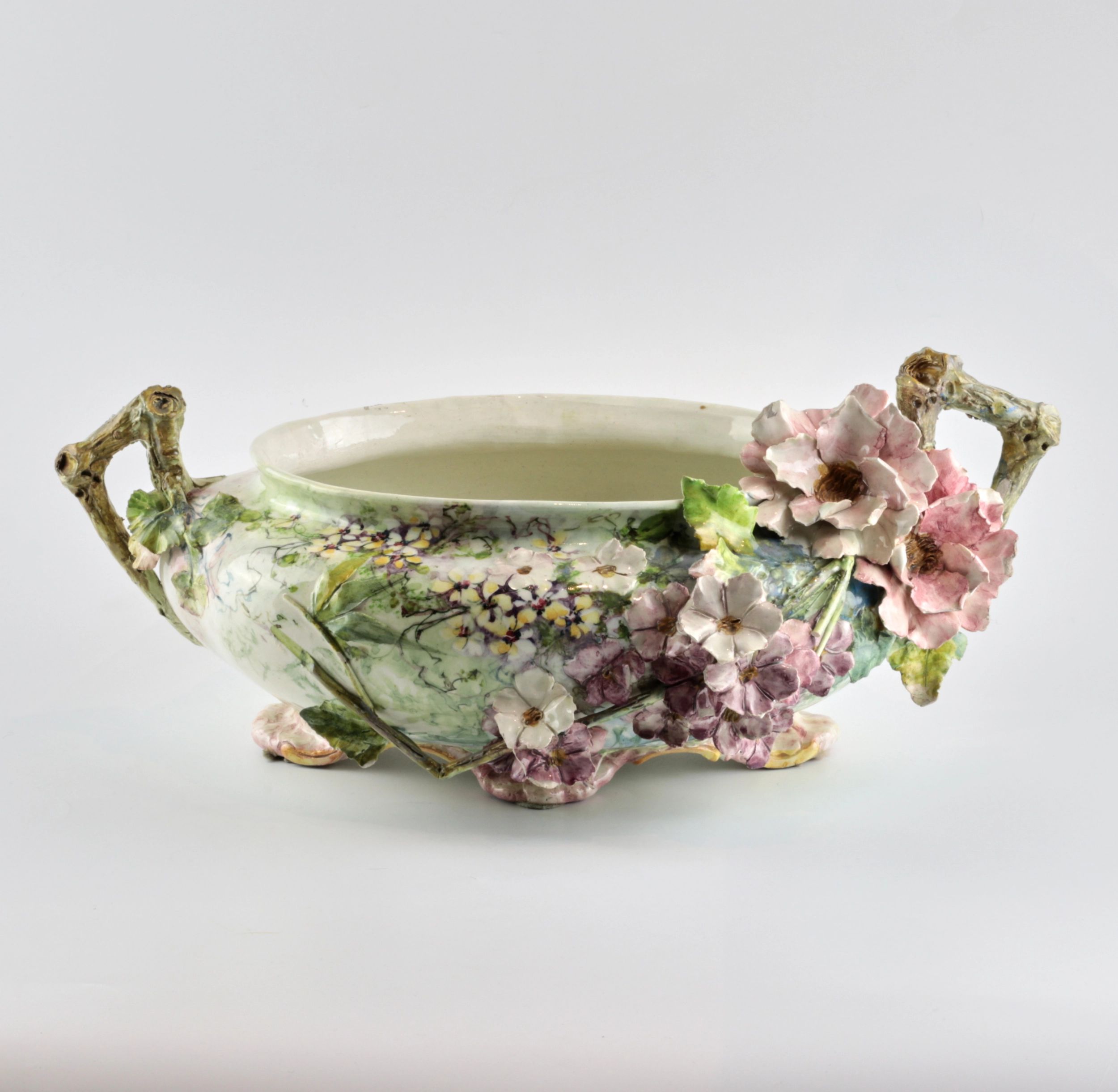 Liberty-style-faience-pot-with-sprouting-flowers