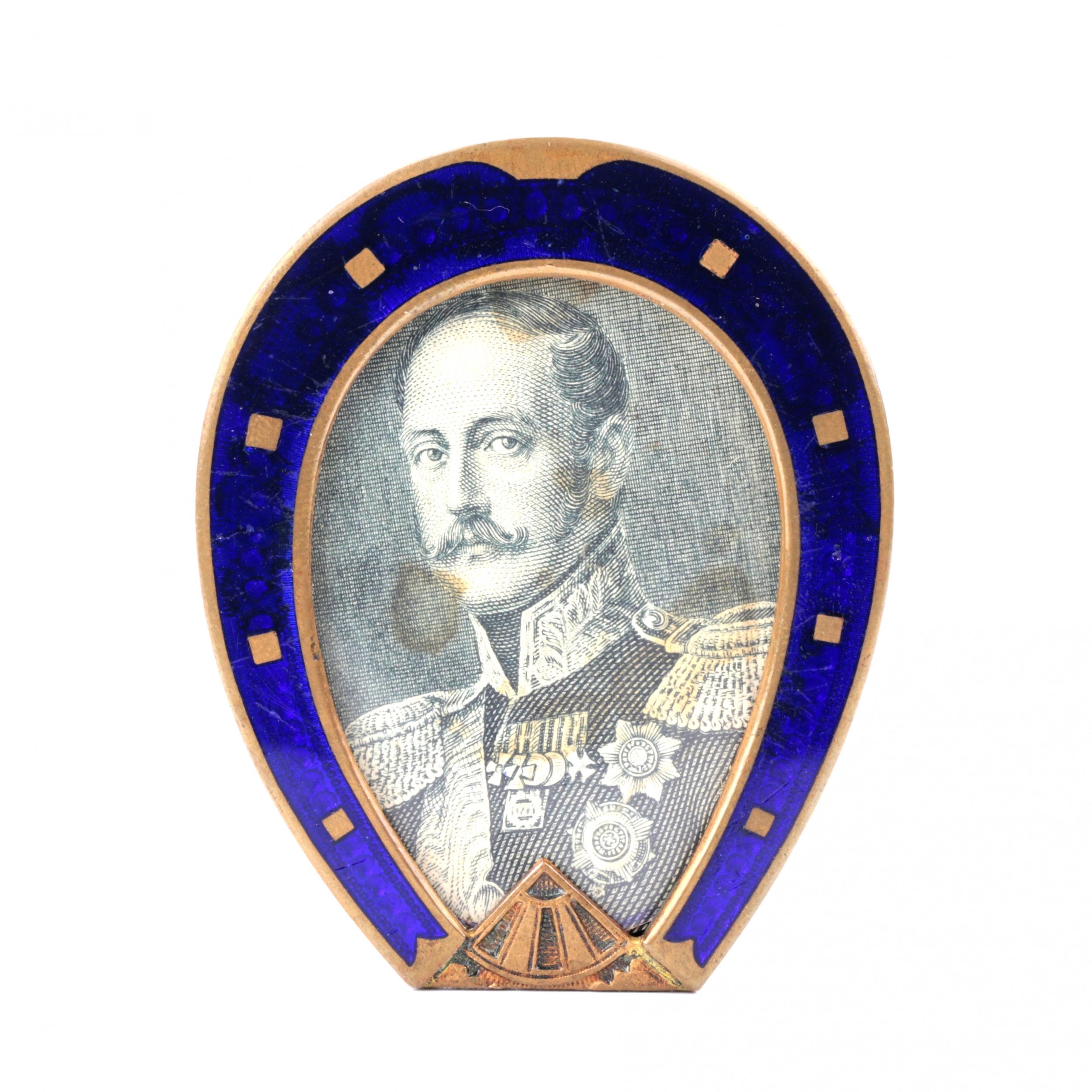 Photo-frame-in-the-shape-of-a-horseshoe-with-blue-enamel-from-the-late-19th-century-