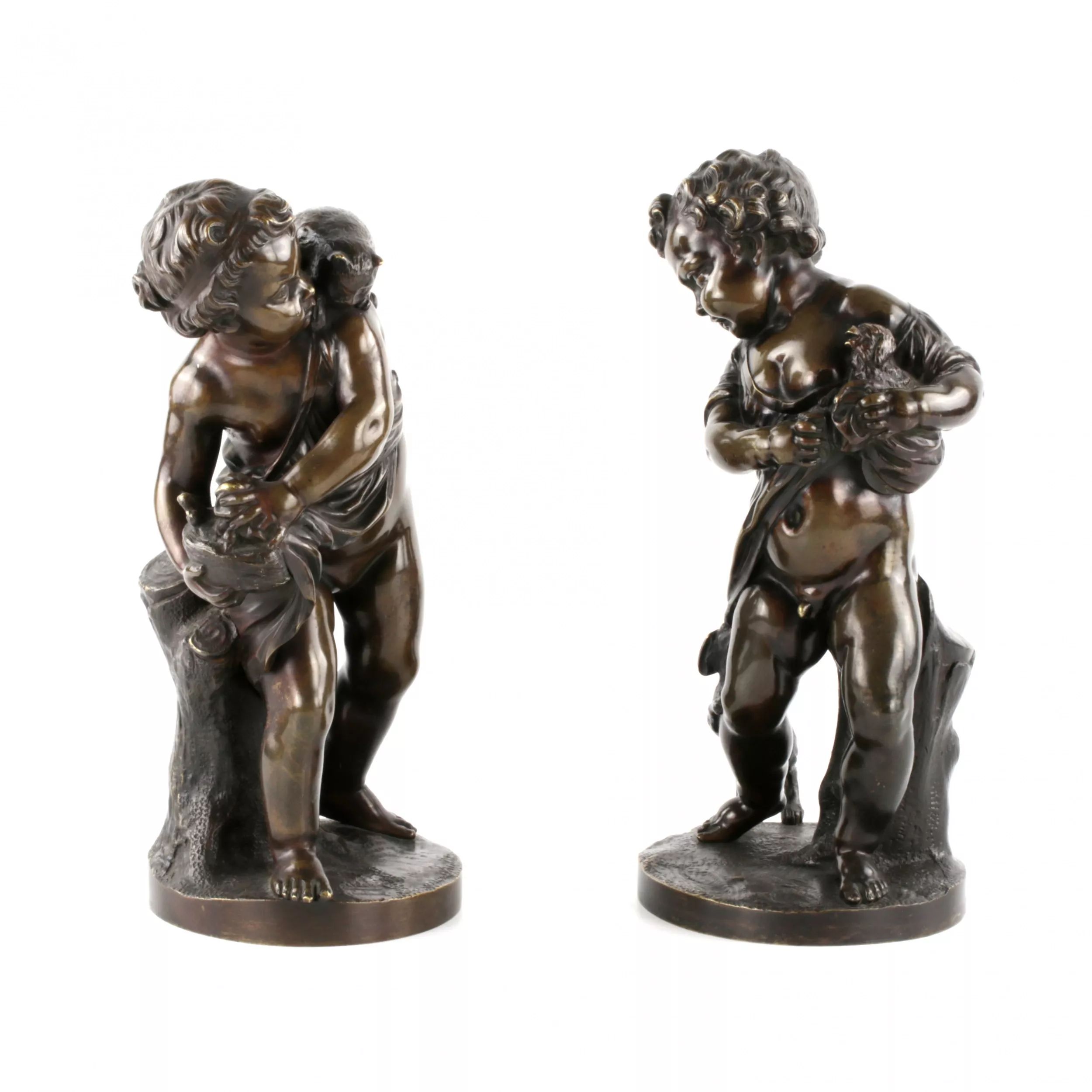 Pair-of-bronze-figures-of-Putti-