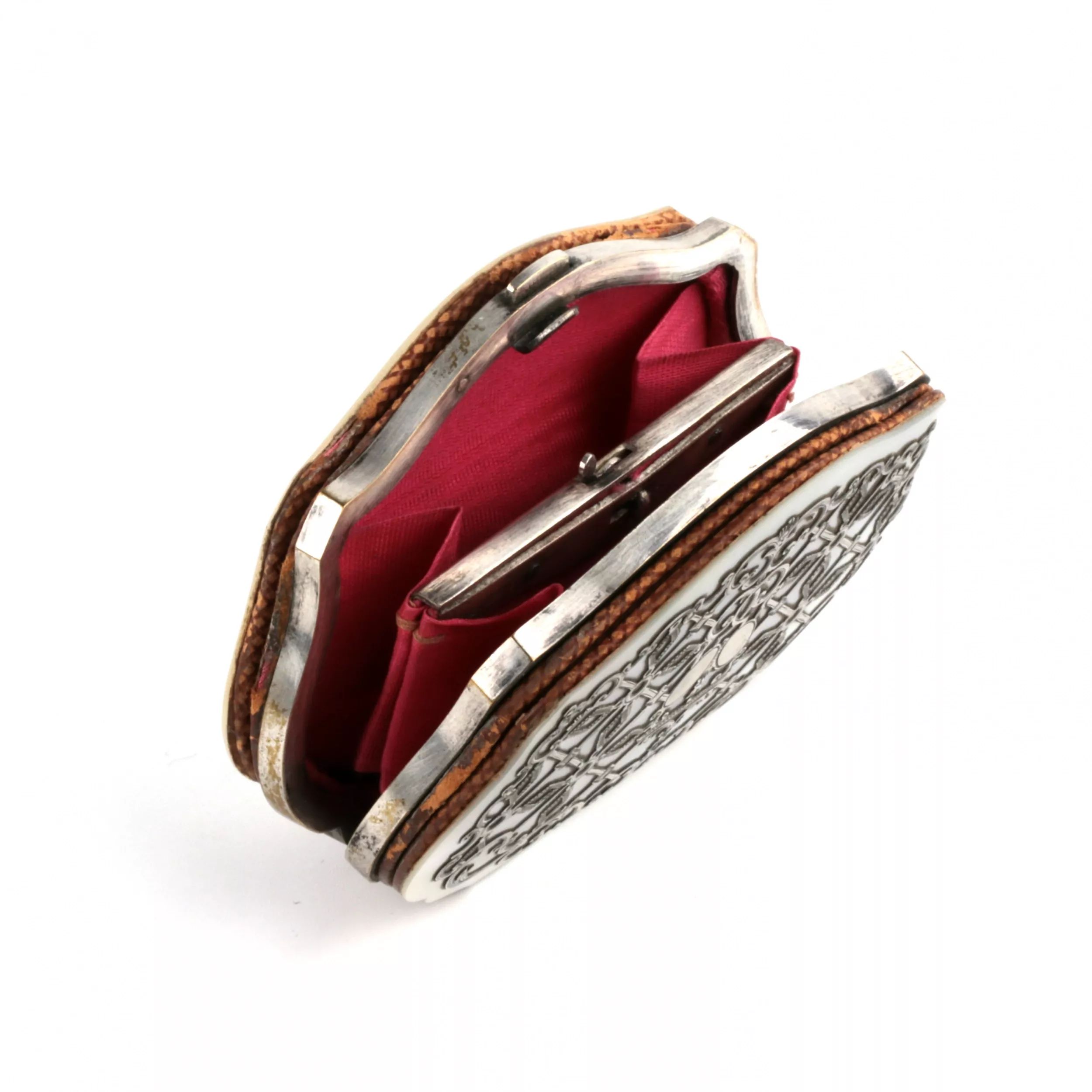 Sleek-wallet-with-mother-of-pearl-lids-and-hidden-compartment-