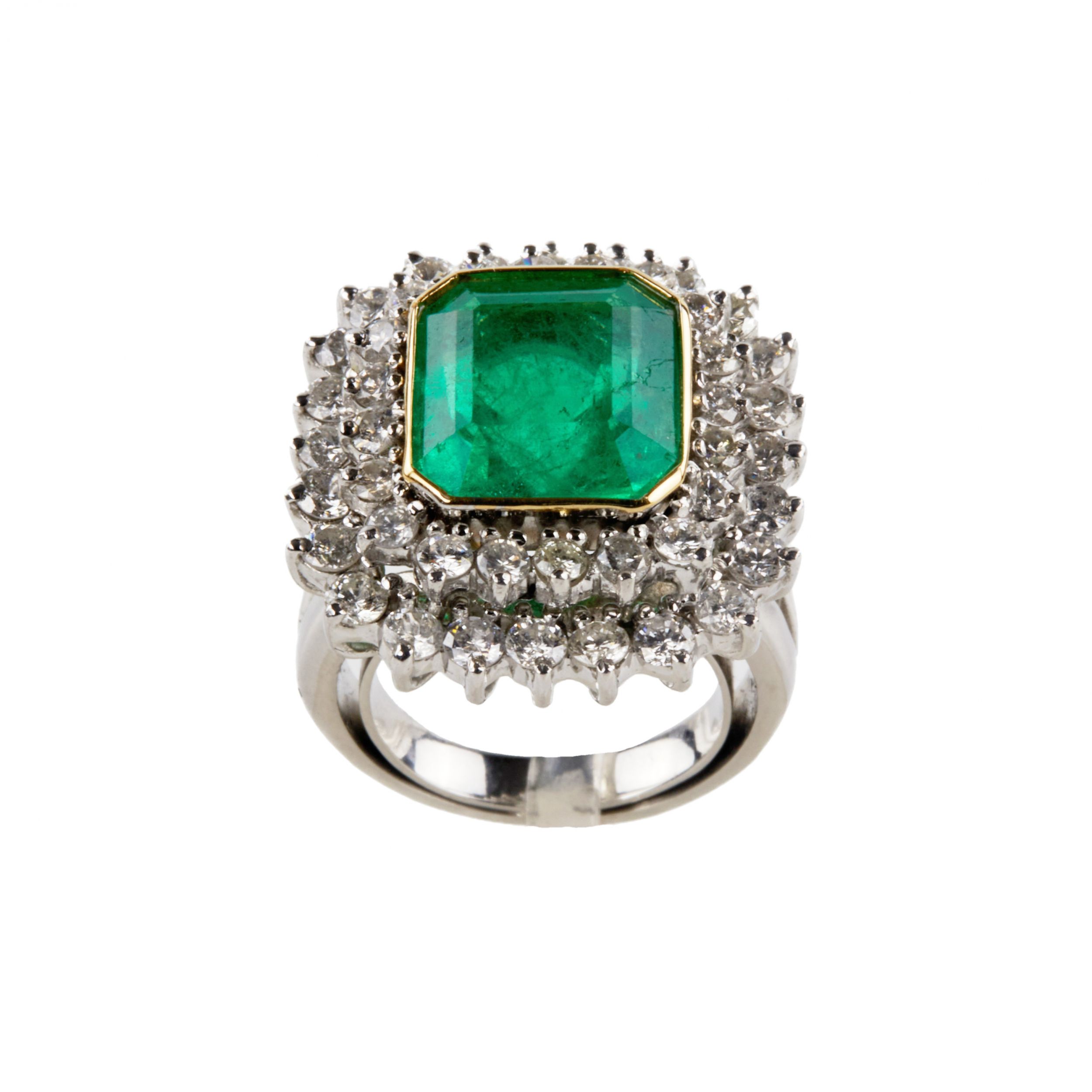 Platinum-ring-with-emerald-and-diamonds-