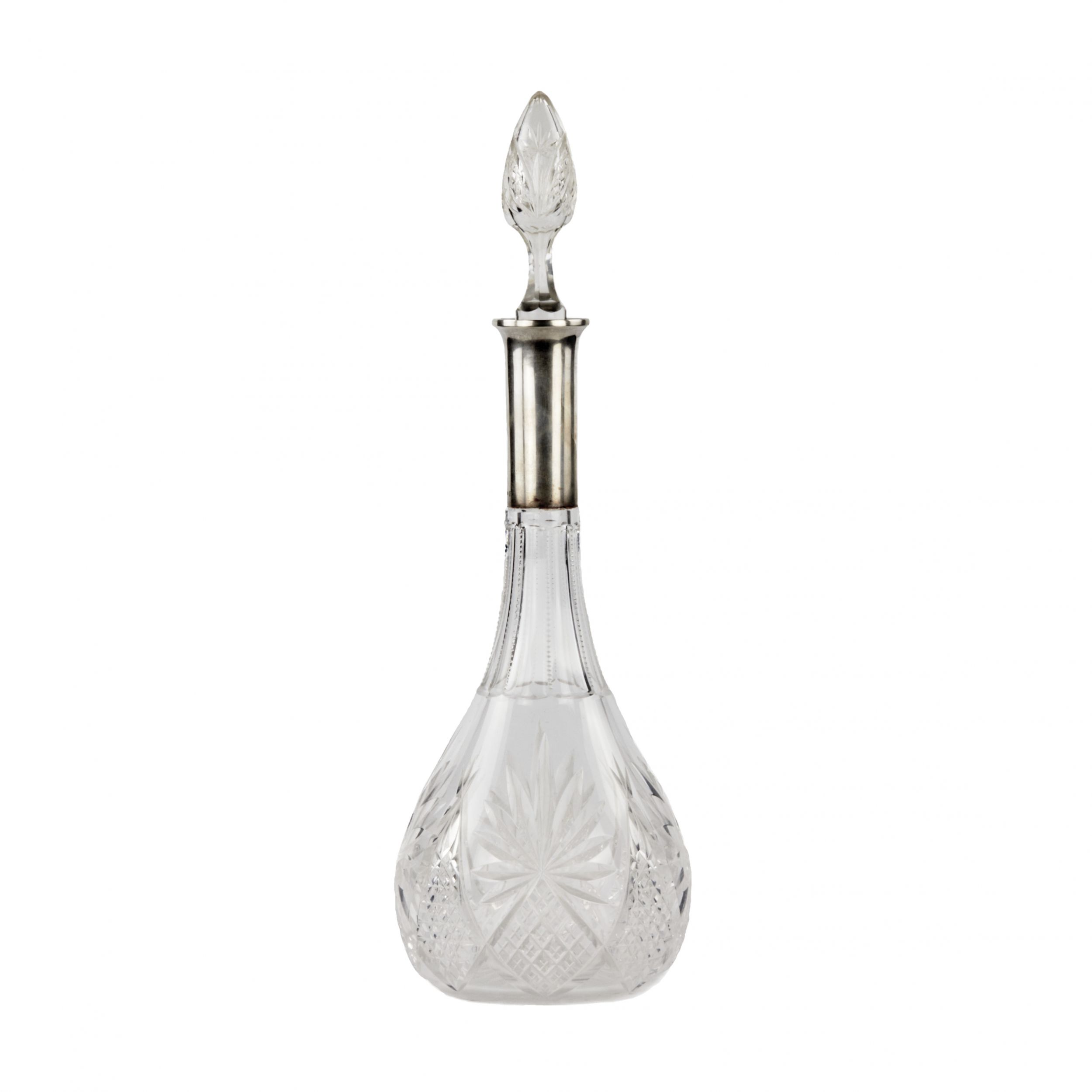 Crystal-decanter-with-a-silver-neck-