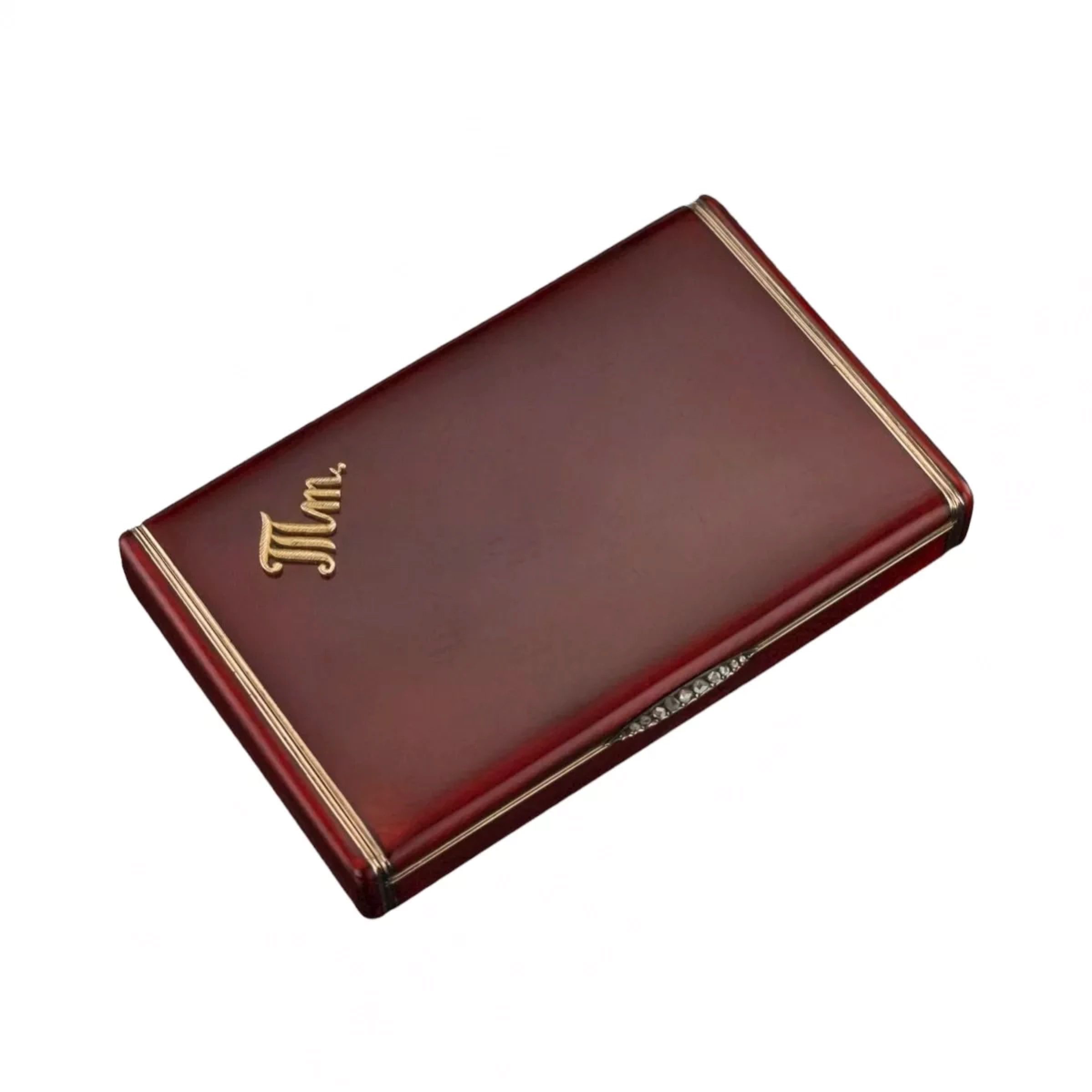 Charming-Russian-made-silver-cigarette-case-made-of-gilded-silver-and-garnet-enamel-