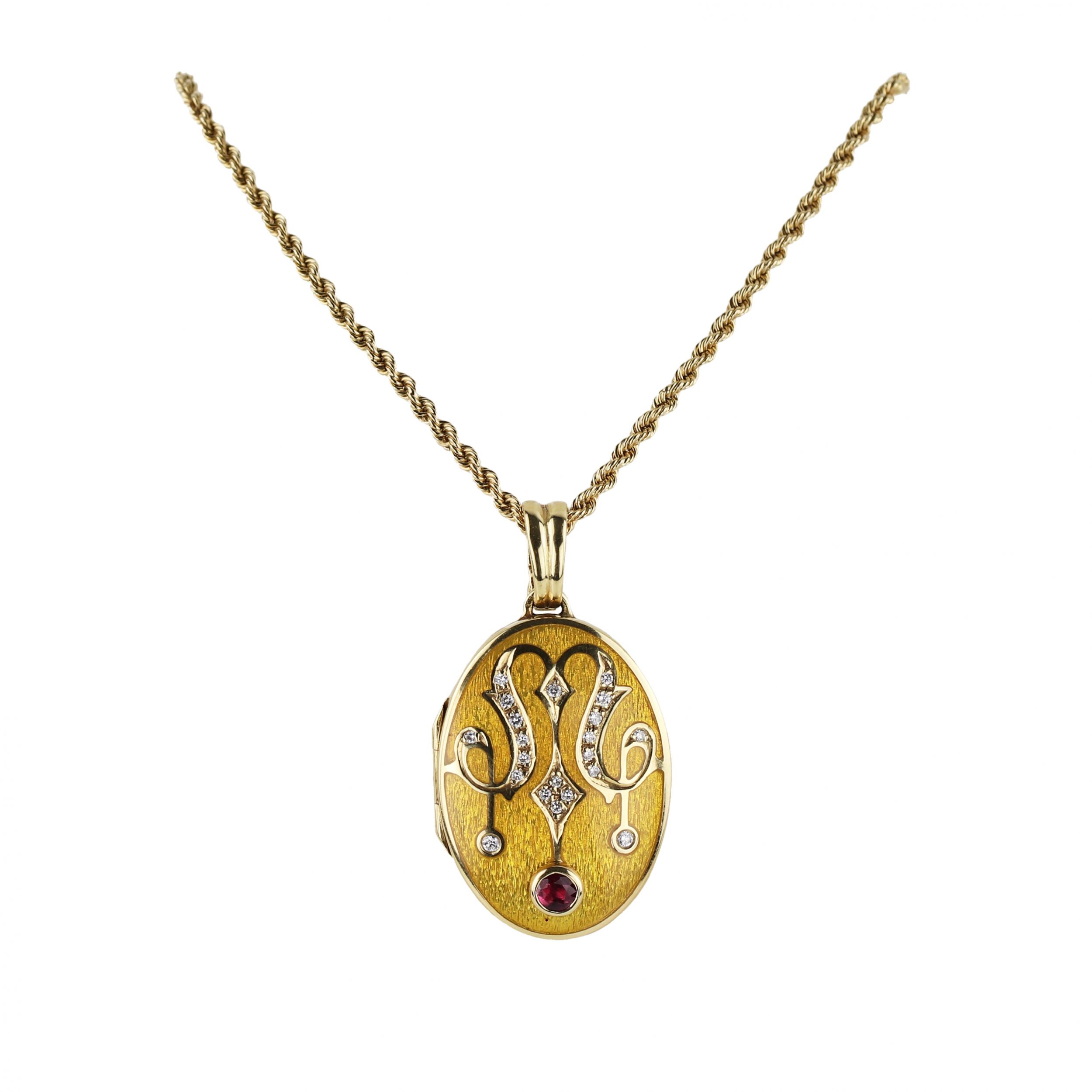 Gold-pendant-on-a-chain-with-a-ruby-in-the-original-case-Faberge-France-